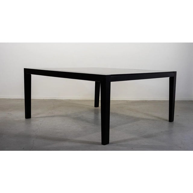 Giorgetti table designed by Massimo Scolari in 1997. It can be used as a dining table or a conference table for your...