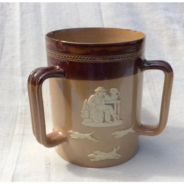 Large Royal Doulton Lambeth Stoneware Tankard. Salt glazed finish with farming scenes circa 1900. Note used condition with...