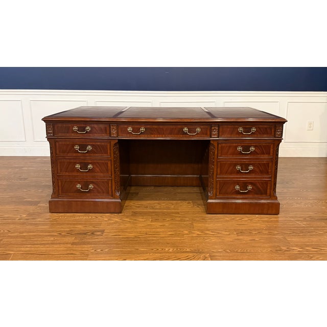 This is a traditional mahogany executive desk by Leighton Hall. It is Leighton Hall’s most popular desk. It features...
