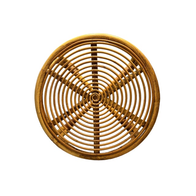 Crafted from bamboo with rattan-wrapped accents, this mid-century Italian side table features a sculptural spiral top and...