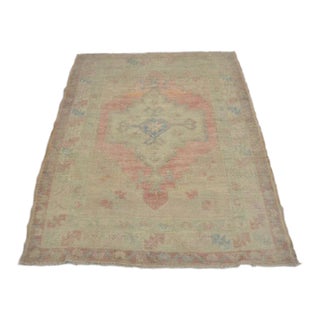 Distressed Vintage Oushak With Soft Geometric Medallion Rug For Sale