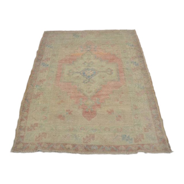 Distressed Vintage Oushak With Soft Geometric Medallion Rug For Sale