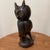 The Folk Art Hand-Crafted Solid Teak Wood Owl Statue by Peter Nish Circa 1981 is a unique and charming decorative...