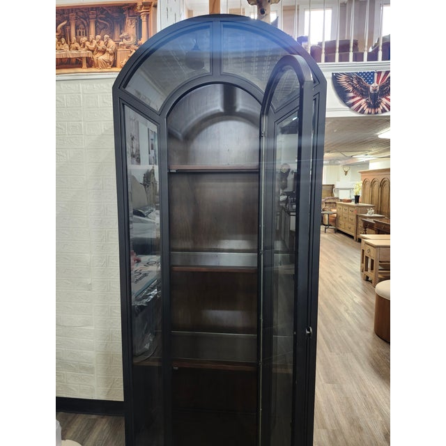 The Hammary Apothecary Cabinet (090-762) is a striking and functional statement piece from the Hidden Treasures...