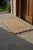 This handcrafted rectangular jute doormat brings natural texture and understated elegance to any entryway. Woven from...