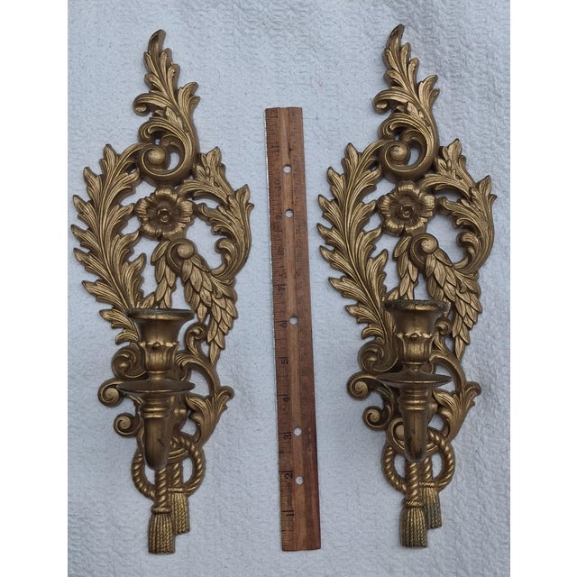 A true matched pair of vintage gold-tone wall candle sconces made by the Burwood Products Company of Traverse City,...