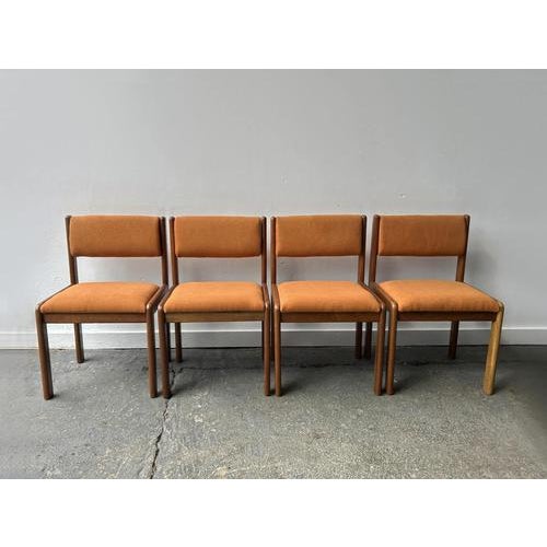 These four matching Mid-Century modern dining chairs are by British furniture maker G Plan. The minimal, geometric design...
