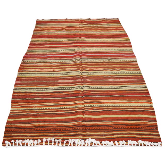 Vintage Turkish Anatolian hand woven kilim with natural colors, soft texture and fine weave.
