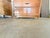 Italian Walnut Dresser in the Style of Luigi Saccardo for Gasparello, Circa 1950s A sophisticated Italian walnut dresser...