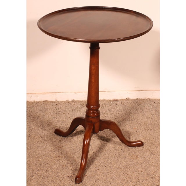 Elegant English mahogany side table, circa 1800. This small, unusual model, being smaller and lower than usual, is known...