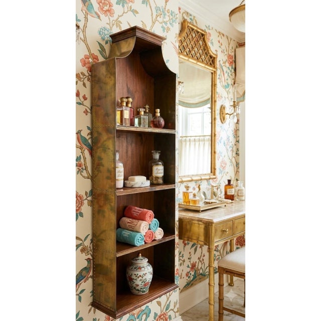 Elevate your space with this rare stunning vintage Spanish brass-clad and solid wood pagoda-style wall shelf.in the style...