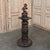 Hand-carved during the latter years of the 18th century, this charming sculpture depicts a young lad just finishing his...