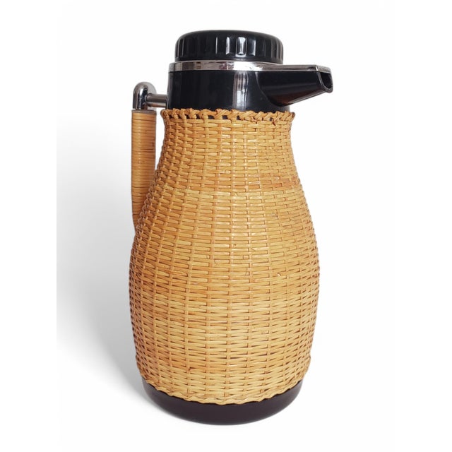 Vintage Midcentury Scandinavian Wicker-Lined Thermos Pitcher –Sweden 1960s Elevate your serveware collection with this...