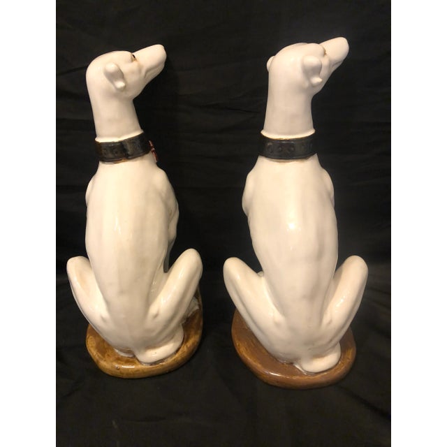 Offered is a fabulous ceramic pair of Italian vintage Hollywood Regency Whippet Greyhounds. It is quite rare to find a...