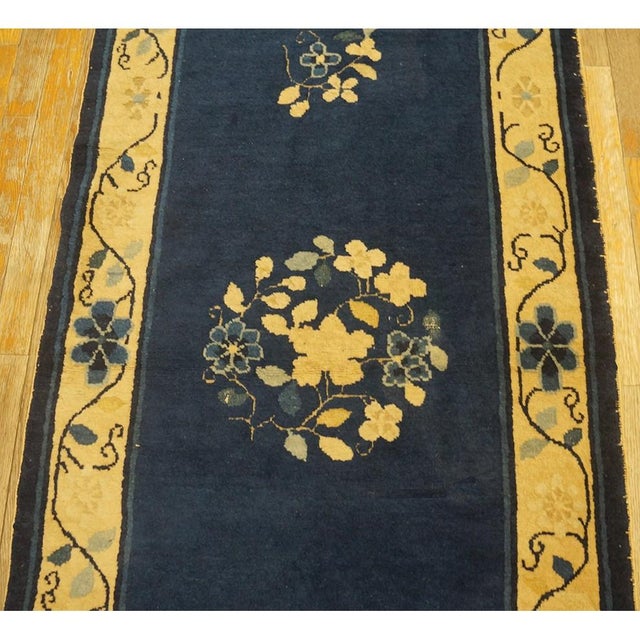 Hand Knotted Pile 1920s Blue Wool Rectangle Antique Rug, Circa Date: 1920s. This exquisite piece exemplifies the refined...