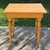 This is an antique primitive tall wood side table that measures 30.75” tall, 27.5” wide, and 23.25” deep. The table is an...
