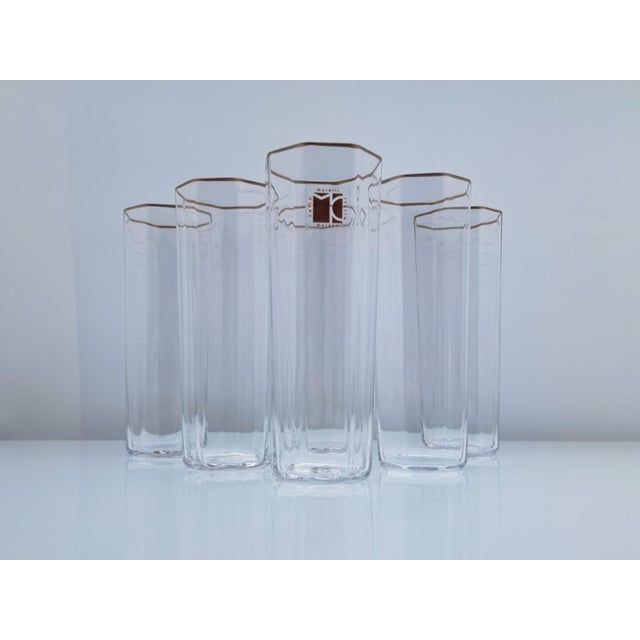 Set of six Murano glass flutes and tall glasses, all signed by maestro Carlo Moretti. The late 1970s and early 1980s...