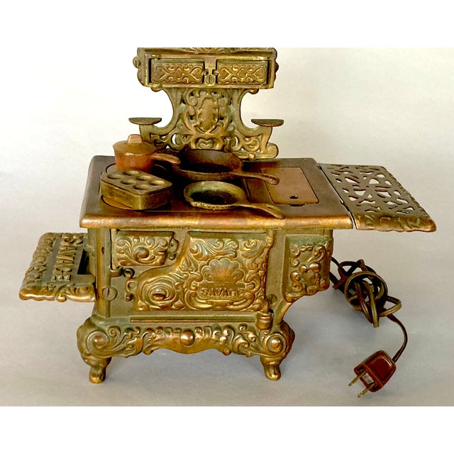 Cute attack! Just how much fun can we have in the antiques realm? This cast iron stove-lamp takes the title for both fun...