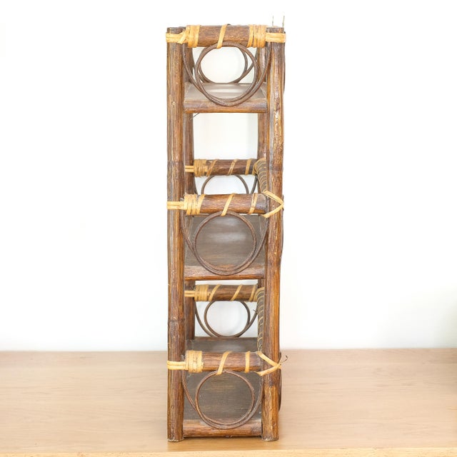 Beautiful rattan/wicker shelf, which can stand along or hung on the wall. These types of shelves are attributed to French...