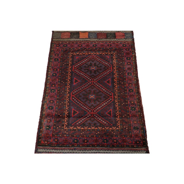 Hand knotted in wool, this 2x4 Baluch rug represents a new line of tribal carpets in the Modern Classics Collection by Rug...