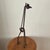 This vintage iron whimsical handcrafted rusted giraffe sculpture is a charming addition to any room. Standing tall and...