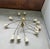 Design Firm selling mid century modern pendant light with 12 lights and flared base as a part of renovation in the...