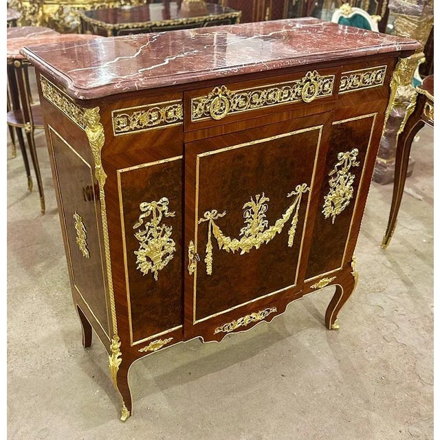 In love with the design and details. Magnificent French marquetry commode with marble inlays Louis XVI style. Stunning...
