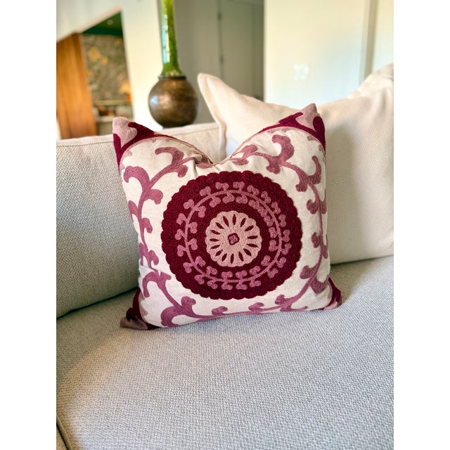 Pretty in Pink! This lovely pillow cover (with down insert) features a central medallion encircled by vines embroidered in...