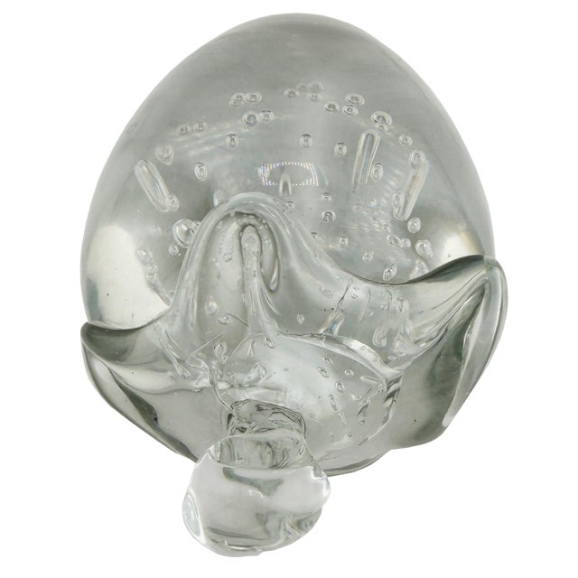 A beautifully executed Murano-style art glass strawberry sculpture, hand-blown in crystal-clear glass with suspended...