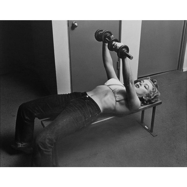 A complete black and white photography portfolio consisting of ten iconic silver gelatin prints of Marilyn Monroe by...