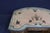 Decorative Italian Provincial kneehole desk featuring a cream-painted finish with hand-painted floral bouquets and...