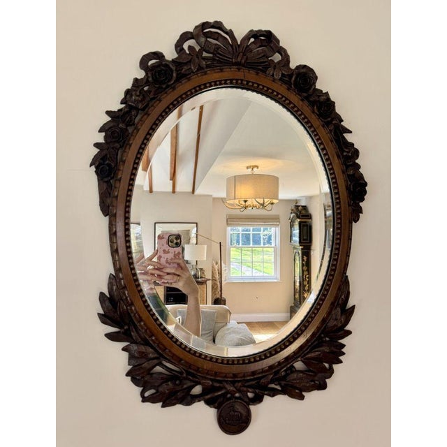 Fantastic quality antique 19th century carved oak wall mirror, having a quality highly carved oak frame casing an oval...
