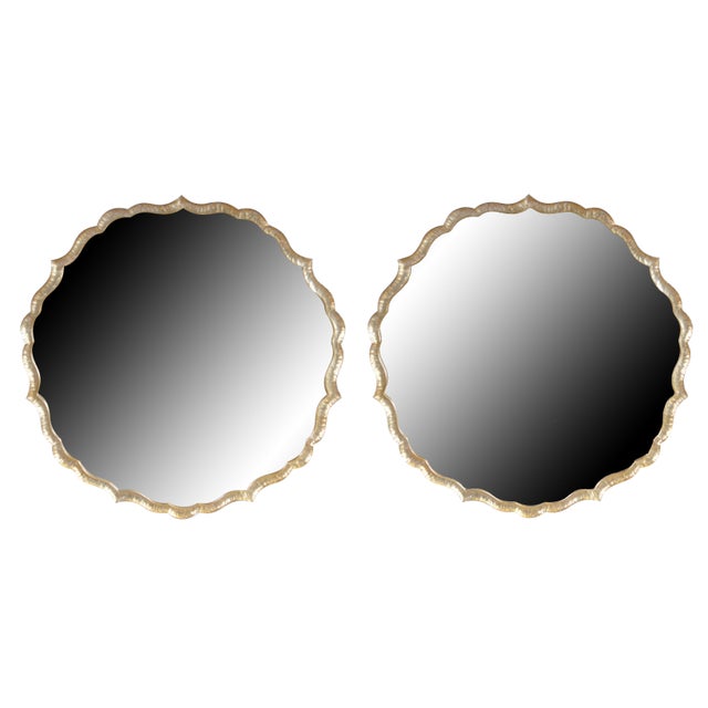 #47409 Pair of Zentique Hollywood Regency Wall Mirrors Pair. Features a large distressed metal scalloped frame with...