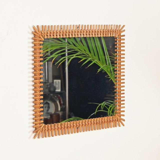 Wonderful and very unique pair of rectangular mirrors, entirely crafted in rattan and hand-woven wicker. These stylish...