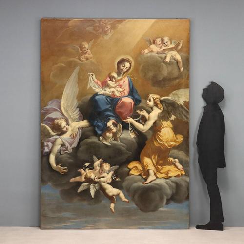 Oil on canvas. Emilian school, 18th century. The large canvas depicts the Madonna in glory, seated on clouds in the sky,...