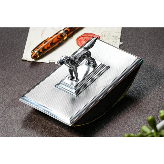 This extraordinary English sterling silver desk ink blotter, fully hallmarked for Birmingham 1935, is a rare and luxurious...