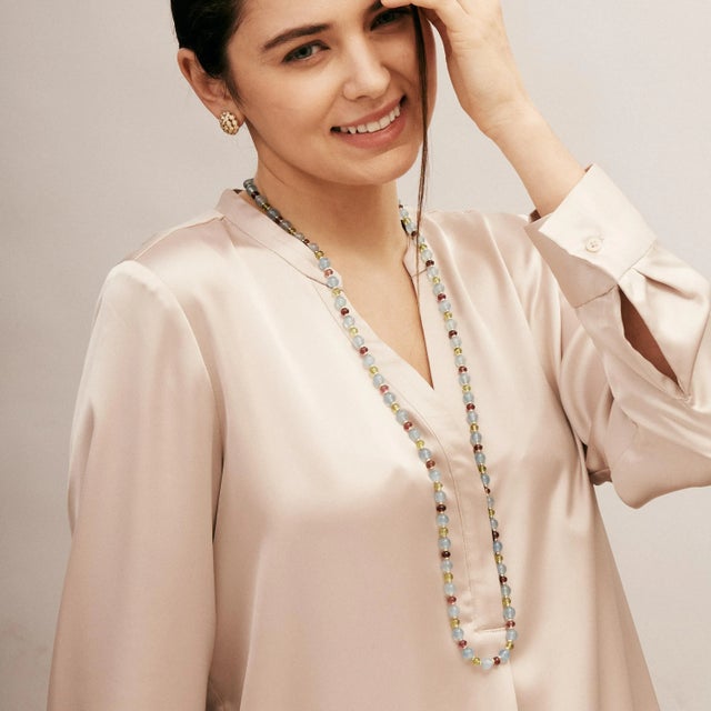 Created in 18 karat yellow gold 36 inch length Aquamarine 240 cts approx Rubellite 40 cts approx Peridot 50 cts approx...