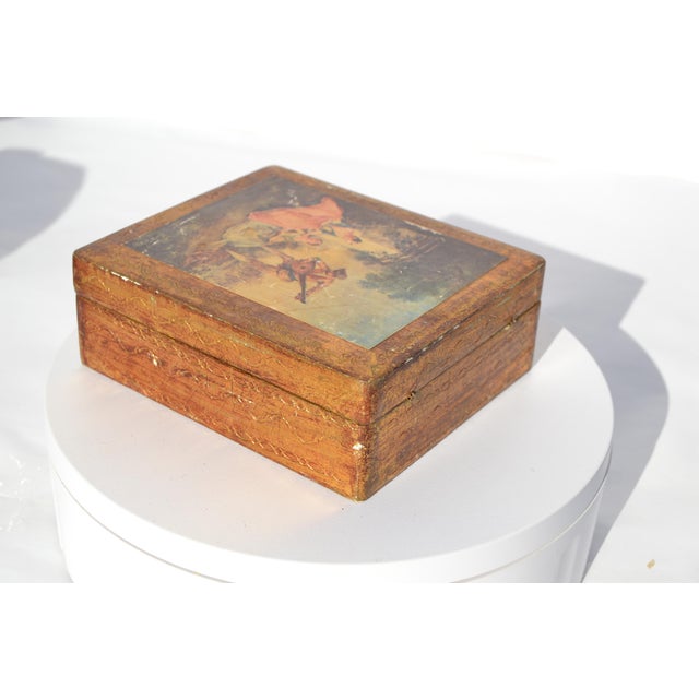 Vintage box made of wood of a lady being serenaded by a couple of men. How romantic! Made in Italy. In good condition.