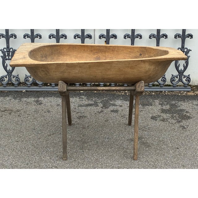 Our European vintage and antique wooden dough bowls or trogs are hand-hewn from whole split logs. They all feature...