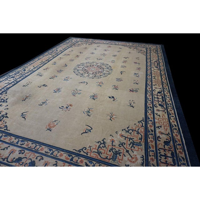 Antique Large Chinese - Peking Knotted Rug artisanal, Circa Date: 1920s. This exceptional piece represents the height of...