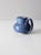 This is a vintage art studio pottery mug. The hand-crafted mug features a beautiful blue glaze and large handle. The base...