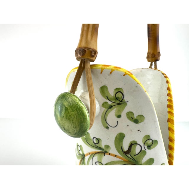 Charming and sculptural, this hand-painted Italian ceramic vessel brings a refined rustic appeal with its elegant...