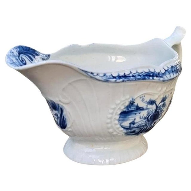 A rare early First Period Dr Wall Worcester porcelain sauce boat dating to circa 1760. An appealing example of early...