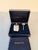 Tiffany & Co. sterling silver perfume flask and funnel set with navy blue silk carrying bag and fitted presentation box...