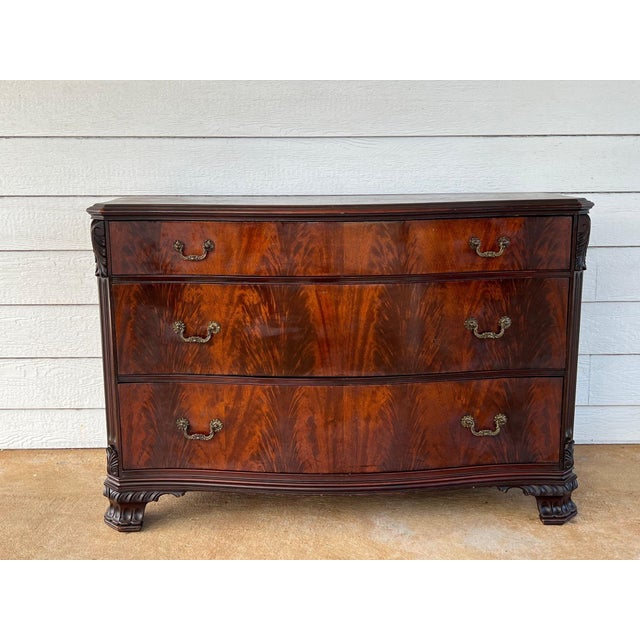 Antique Georgian Revival Chest of Drawers Flame Mahogany Serpentine Carved c1940. Classic and timeless, this beautiful...
