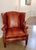 Elevate your space with this stunning Vintage Dutch Cognac Colored Wingback Leather Club Chair. Handmade in Holland by...