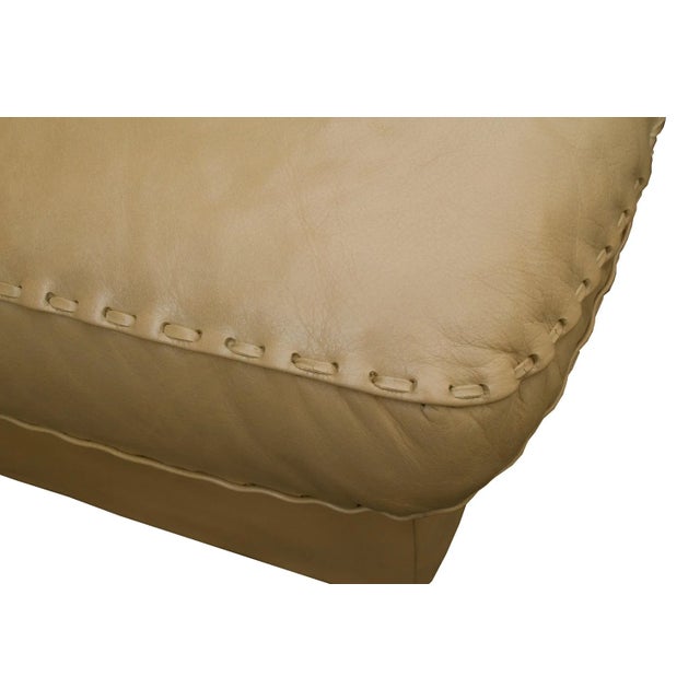 60s leather stool / leather armchair from De Sede. Model DS 101, execution in genuine leather, color sand / caramel. The...