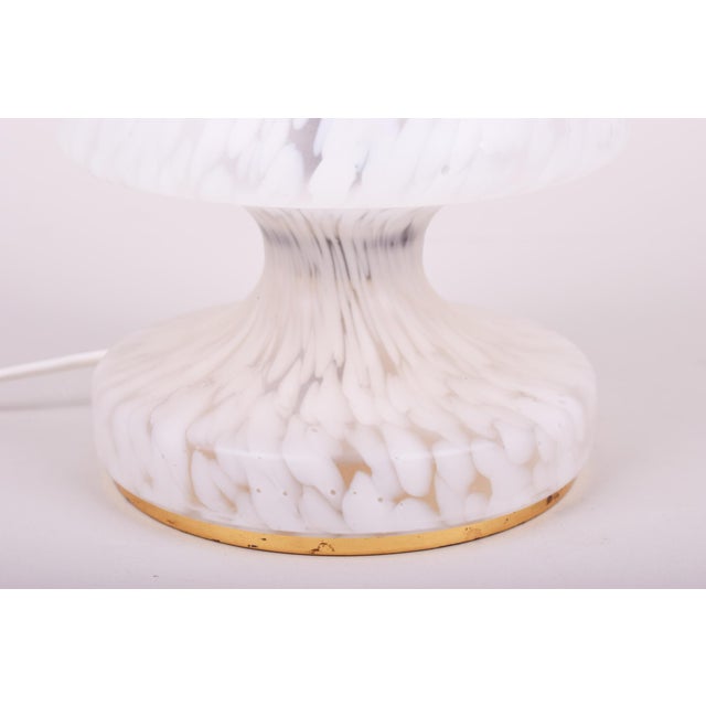 This charming table lamp comes from Czechoslovak production of the 1960s. Its safety and technical quality are attested by...