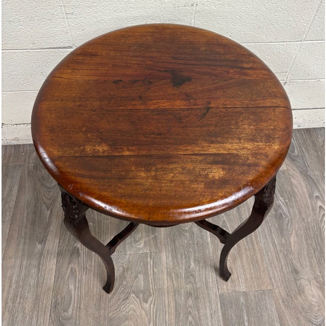 This is a gorgeous antique Victorian walnut round parlor table or lamp table, believed to be from the late 1800s. Features...