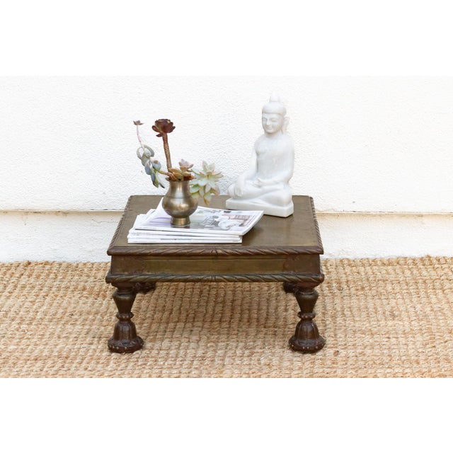 This vintage bajot table, once a cherished possession in an Indian home, exudes a captivating blend of artistry and...